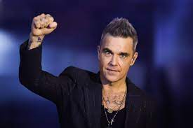 Robbie Williams llegará a México como headliner en Tecate Emblema